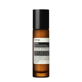Aesop Solaris Replenishing Hand Serum in an amber glass bottle with a black cap and white label, centered on a plain white background.