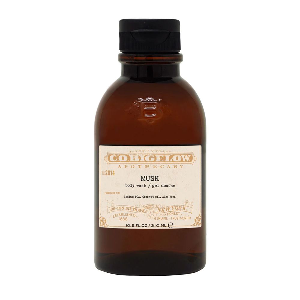 Brown bottle of Co. Bigelow Musk body wash on a white background